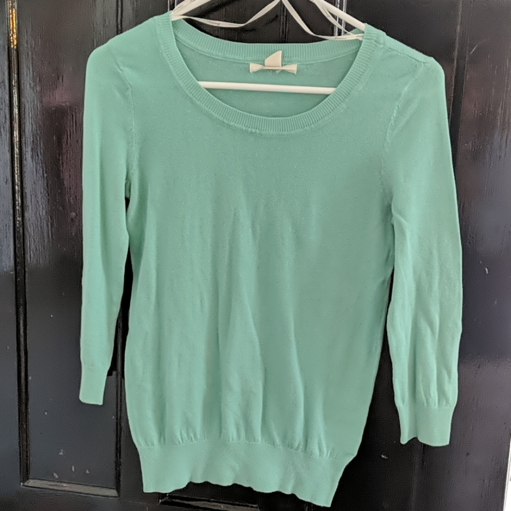 Quarter sleeve sweater